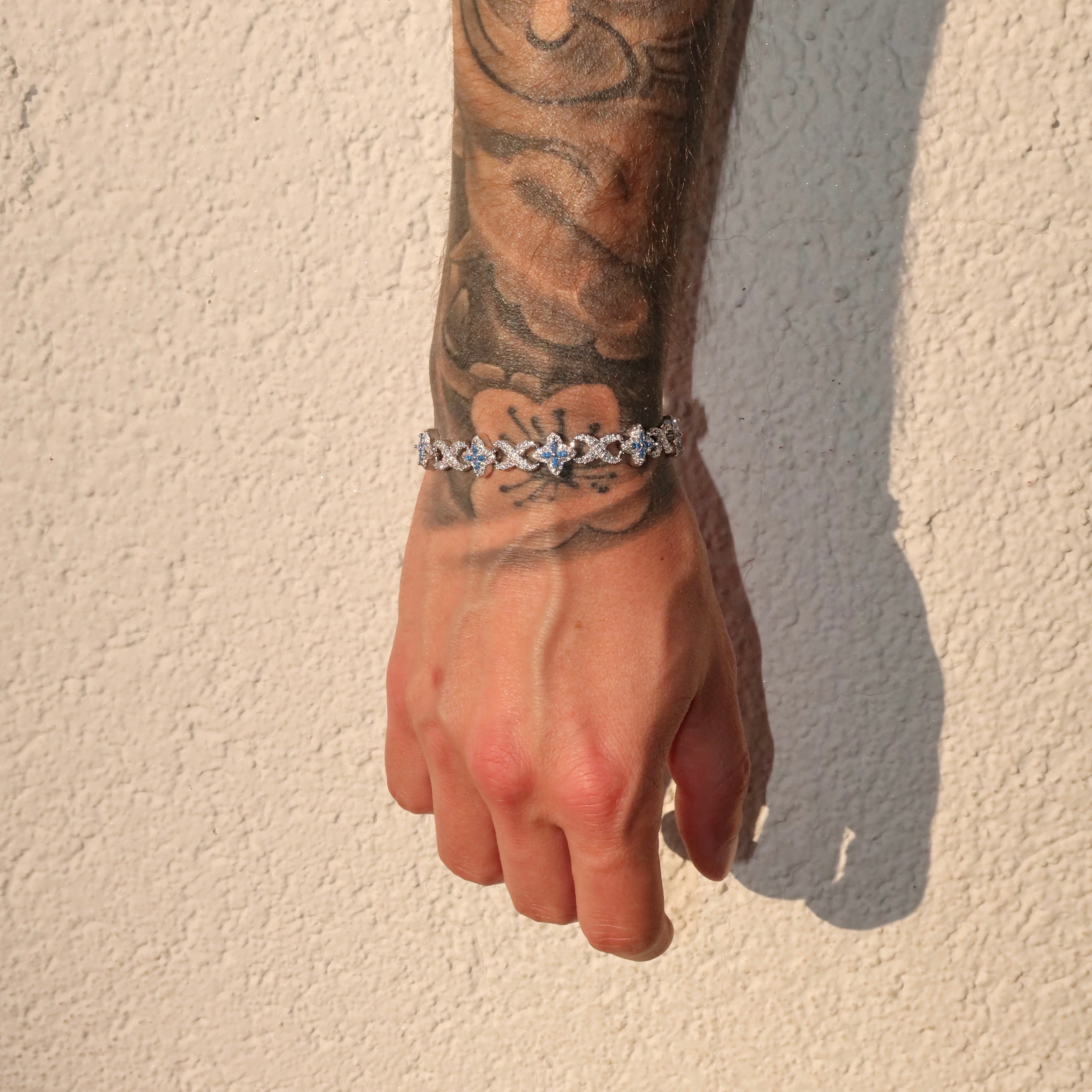 White Gold Plated 10mm Iced Infinity Aqua Clover Bracelet